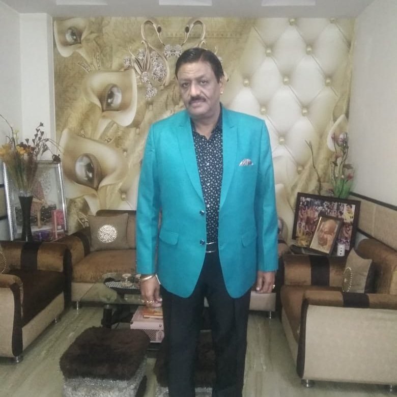 Rajesh Bajaj, founder of Star Musical Entertainer, performing live on stage